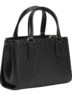 Sac à main noir pourvu d'une bandoulière amovible et de détails dorés