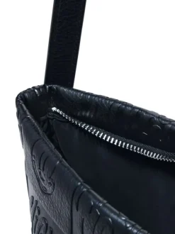 Sac à main noir zippé avec des motifs de dessins animés embossés