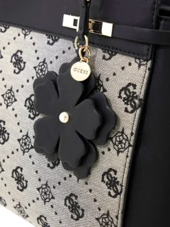 Sac à main porté épaule beige et noir orné d'un motif monogramme