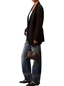Sac noir avec des motifs monogramme taupe muni d'une bandoulière