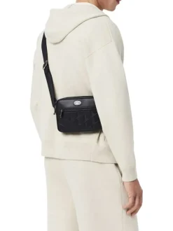 Sacoche en cuir de vache noire à motif embossé pourvue d'une bandoulière