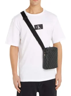 Sacoche noire grainée avec monogramme blanc imprimé et bandoulière réglable