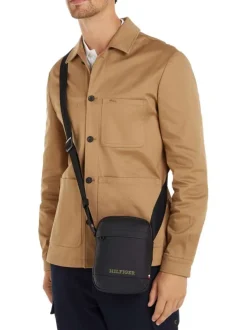 Sacoche noire unie à bandoulière ajustable fermeture zippée et logo embossé
