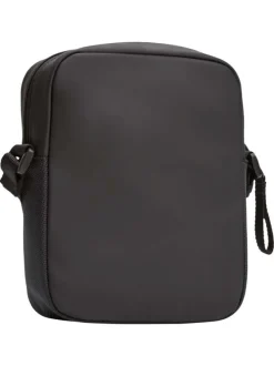 Sacoche noire unie avec un patch d'authenticité à l'avant et un zip