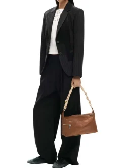Sac porté épaule camel avec des motifs floraux muni d'une bandoulière
