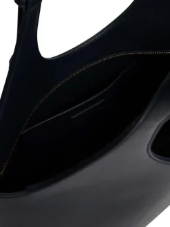 Sac porté épaule marine pourvu du nom de la marque doré embossé