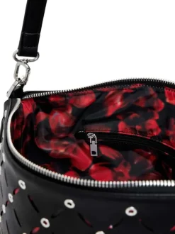 Sac porté épaule noir zippé avec des œillets et des clous décoratifs