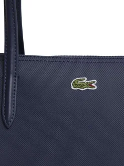Sac shopping marine pourvu d'une fermeture zippée et du logo de la marque