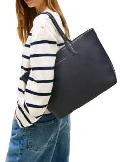 Sac shopping marine uni avec logo doré embossé et fermeture zippée
