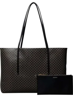 Sac shopping noir avec des motifs monogrammes et muni de deux anses