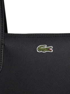 Sac shopping noir pourvu d'une fermeture zippée et du logo de la marque