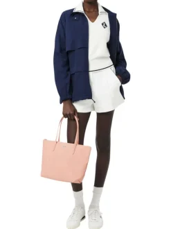 Sac shopping saumon pourvu d'une fermeture zippée et du logo de la marque