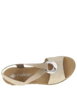 Sandales beiges avec une sangle élastiquée et à talon compensé
