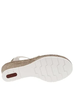 Sandales beiges avec une tige élastiquée à perles et à talon compensé
