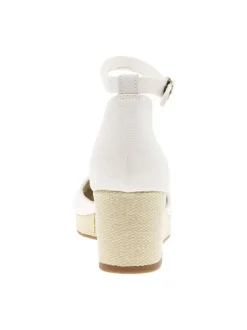 Sandales blanches avec le logo brodé à bout fermé et à talon compensé