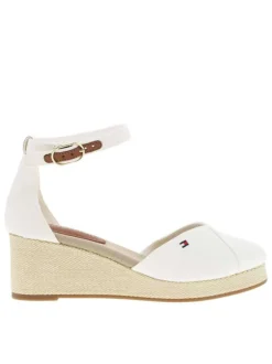 Sandales blanches avec le logo brodé à bout fermé et à talon compensé