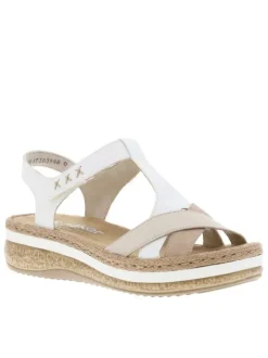 Sandales blanches et beiges à talon compensé et avec des sangles