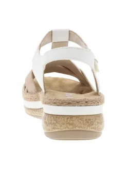 Sandales blanches et beiges à talon compensé et avec des sangles