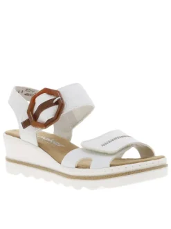 Sandales blanches à talon compensé et à sangle avec une grande boucle à ardillon