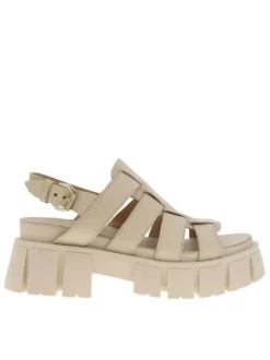 Sandales en cuir écru à semelle chunky fermées par boucle à ardillon