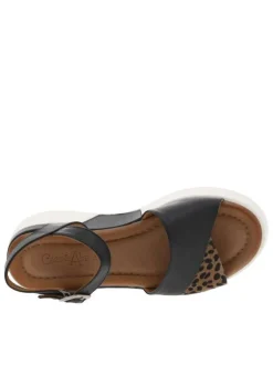 Sandales en cuir noires et blanches à détails léopard et à talon compensé