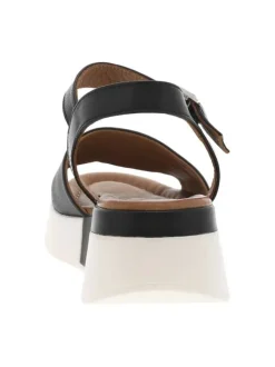 Sandales en cuir noires et blanches à détails léopard et à talon compensé