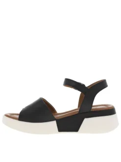 Sandales en cuir noires et blanches à détails léopard et à talon compensé