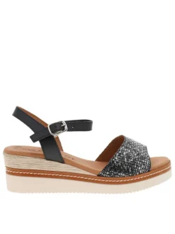 Sandales en cuir noires à talon compensé avec une boucle à ardillon