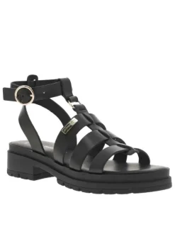Sandales noires avec des sangles à talon décroché moyen et à boucle à ardillon