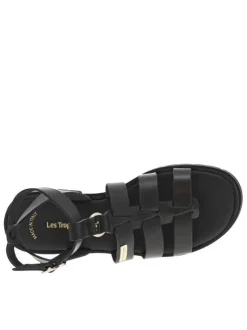 Sandales noires avec des sangles à talon décroché moyen et à boucle à ardillon
