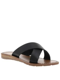 Sandales noires à talon plat avec marque imprimée sur la semelle
