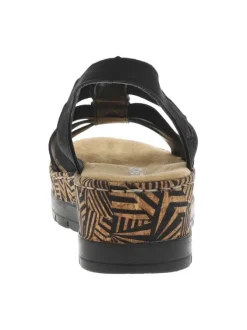 Sandales noires à tige élastiquée et avec un talon compensé bas