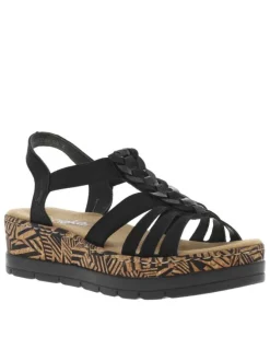 Sandales noires à tige élastiquée et avec un talon compensé bas