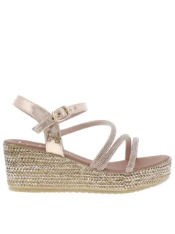 Sandales or roses avec des sangles à strass et à talon compensé