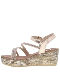 Sandales or roses avec des sangles à strass et à talon compensé