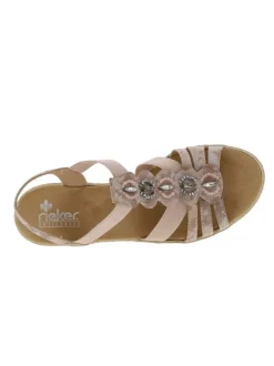Sandales roses à semelle compensée et à bijoux métalliques sur le dessus