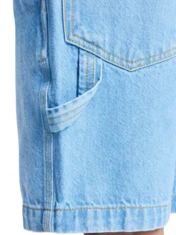 Short en coton bleu uni pourvu de multiples poches et d'une coupe baggy