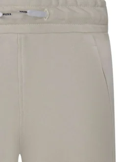 Short en coton mélangé beige uni avec une coupe droite et une taille élastiquée