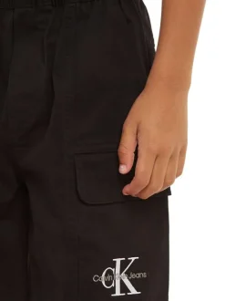 Short en coton noir uni avec une coupe cargo et une ceinture élastiquée
