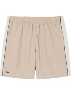 Short beige à coupe ajustée pourvu d'une taille élastiquée froncée