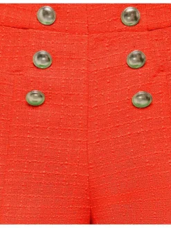 Short chino orange en tweed avec des boutons argentés décoratifs
