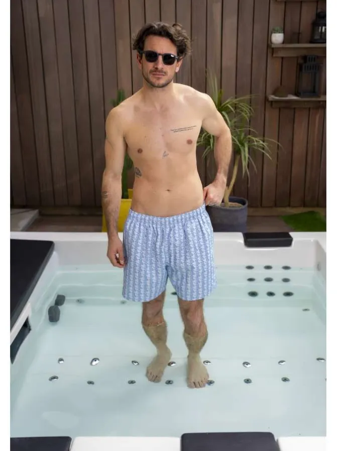 Short de bain bleu à coupe ajustée orné du logo de la marque