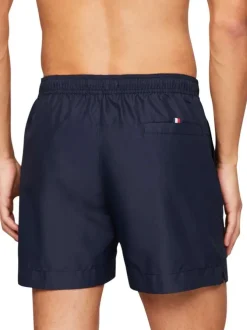 Short de bain marine uni avec une coupe droite et nom floqué