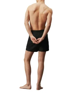 Short de bain noir uni avec une coupe droite et une taille élastiquée