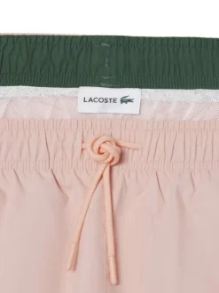 Short de bain rose à coupe ajustée pourvu du logo de la marque