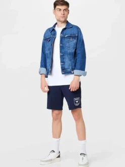 Short de jogging 2 poches marine uni en coton mélangé avec logo blanc