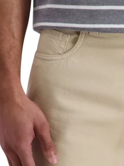 Short en coton beige uni avec une coupe ajustée et des poches italiennes