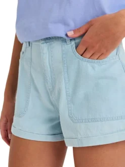 Short en coton bleu à coupe ample pourvu d'une fermeture zippée et boutonnée