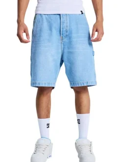 Short en coton bleu uni pourvu d'une coupe baggy et de multiples poches