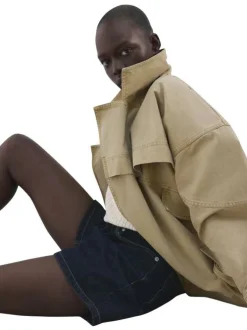 Short en coton brut uni avec une coupe droite et une taille intermédiaire